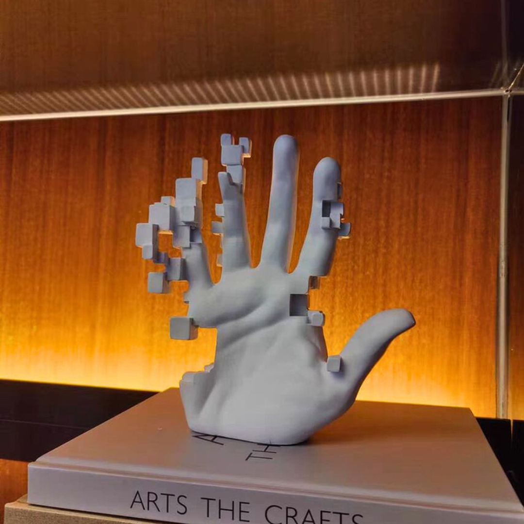 Moderne 3D-Pixel-Hand Skulptur
